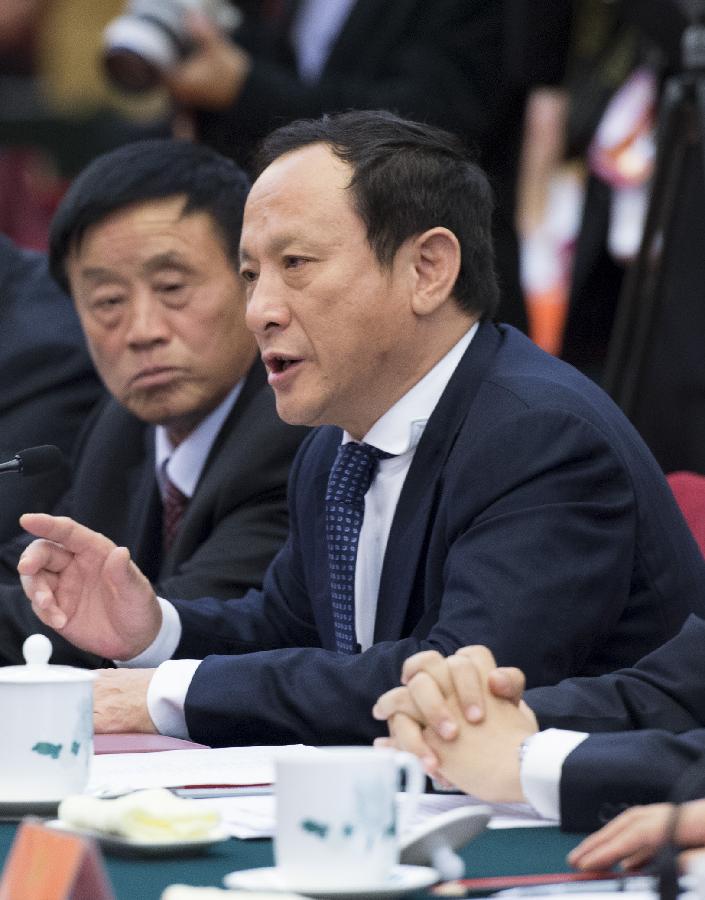 Wang Min, a member of the Jiangsu delegation of the 18th National Congress of the Communist Party of China (CPC), speaks at the delegation's panel discussion in Beijing, capital of China, Nov. 9, 2012. (Xinhua/Wang Ye)