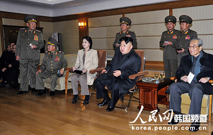 Kim Jong Un, top leader of the Democratic People's Republic of Korea (DPRK) and his wife Ri Sol Ju watch a women's volleyball match between the Pongae team and the Pyongyang team, according to the country's official news agency KCNA's report on Nov.7, 2012. (KCNA)