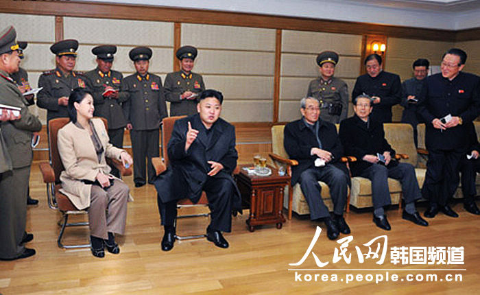 Kim Jong Un, top leader of the Democratic People's Republic of Korea (DPRK) and his wife Ri Sol Ju watch a women's volleyball match between the Pongae team and the Pyongyang team, according to the country's official news agency KCNA's report on Nov.7, 2012. (KCNA)
