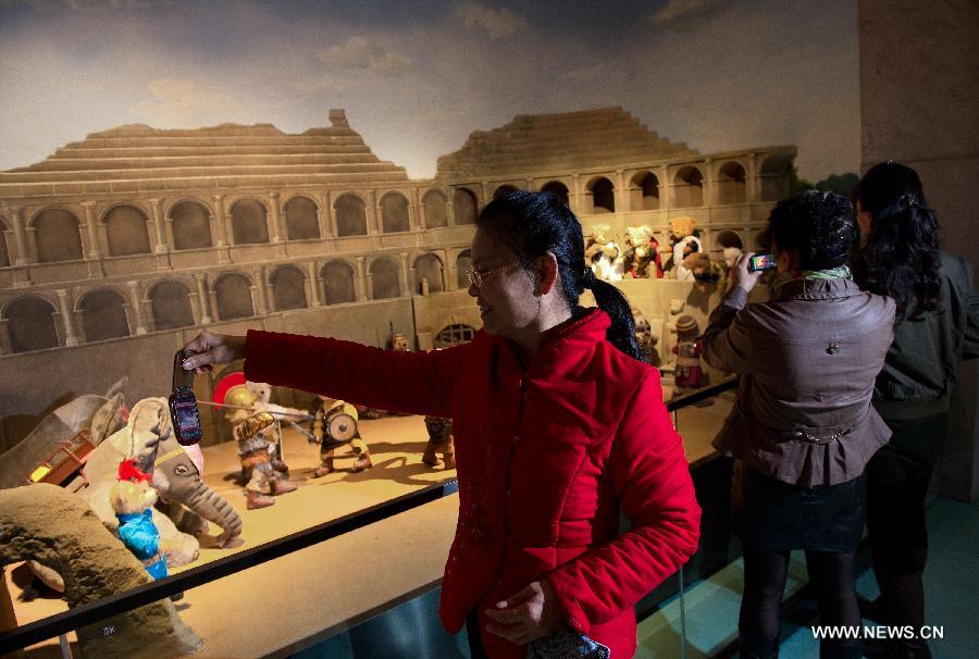 People take pictures of Teddy Bears at a Teddy Bear Museum in Chengdu, capital of southwest China's Sichuan Province, Nov. 11, 2012.  (Xinhua/Jiang Hongjing) 