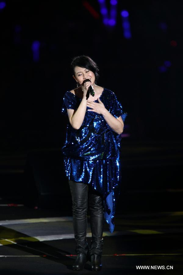 Singer Rene Liu sings at Rock Records 30th Anniversary Nanjing Concert in Nanjing, capital of east China's Jiangsu Province, Nov. 10, 2012. More than 50 singers performed at the concert. (Xinhua/Mao Jinsong) 
