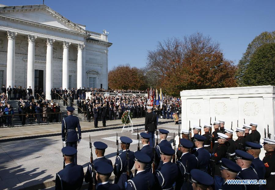 U.S. President Barack Obama takes part in a wreath laying ceremony in honor of the veterans in front of the Tomb of the Unknowns at Arlington National Cemetery outside Washington D.C., capital of the United States, Nov. 11, 2012. (Xinhua/Fang Zhe)
