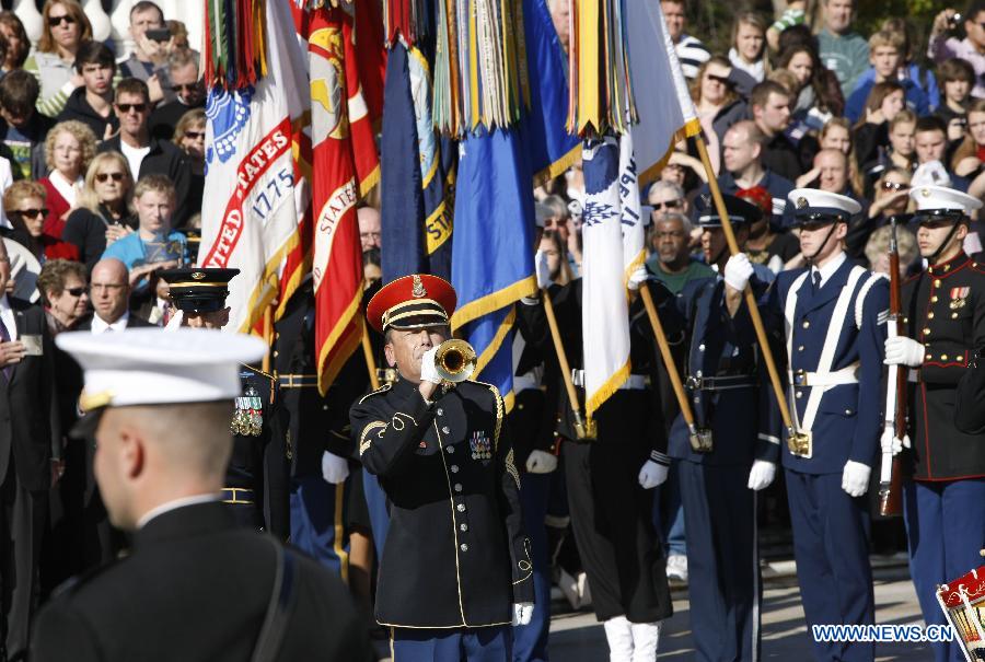 A U.S. band takes part in a wreath laying ceremony in honor of the veterans in front of the Tomb of the Unknowns at Arlington National Cemetery outside Washington D.C., capital of the United States, Nov. 11, 2012. (Xinhua/Fang Zhe)