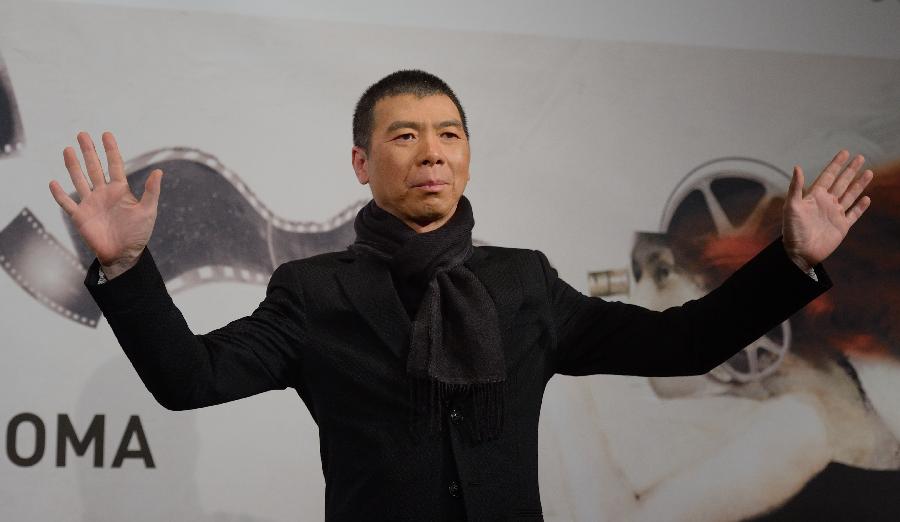 Chinese director Feng Xiaogang poses at the photo-call of his film "Back to 1942" at the 7th Rome Film Festival in Rome, capital of Italy, on Nov. 11, 2012. (Xinhua/Wang Qingqin)