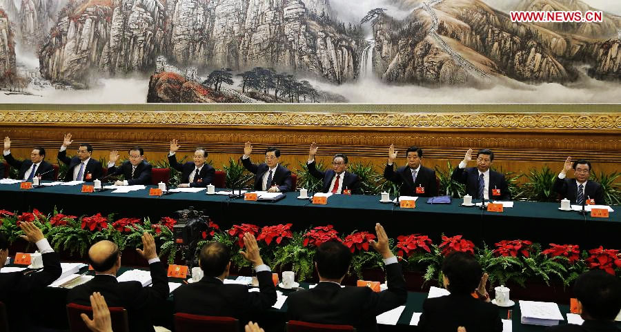 Hu Jintao (C, back), Wu Bangguo (4th R, back), Wen Jiabao (4th L, back), Jia Qinglin (3rd R, back), Li Changchun (3rd L, back), Xi Jinping (2nd R, back), Li Keqiang (2nd L, back), He Guoqiang (1st R, back) and Zhou Yongkang (1st L, back) attend the third meeting of the presidium of the 18th National Congress of the Communist Party of China (CPC) at the Great Hall of the People in Beijing, capital of China, Nov. 13, 2012. (Xinhua/Ju Peng)