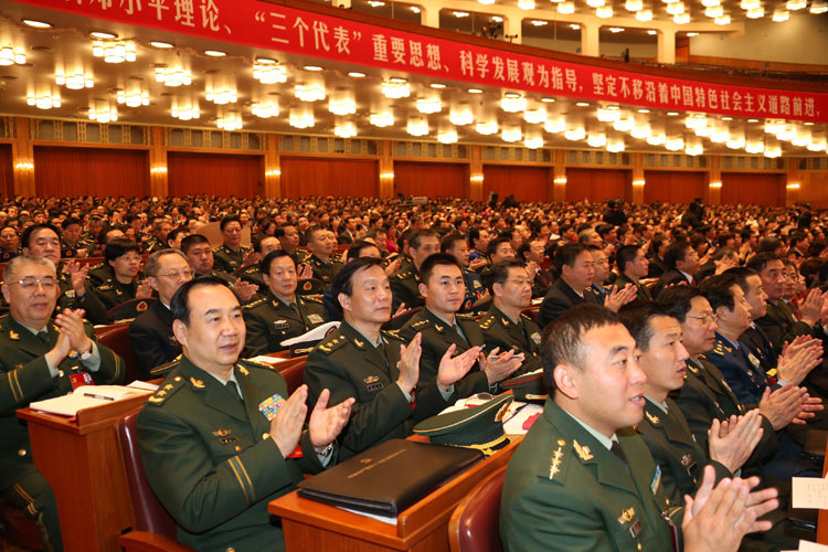 Delegates watch their ballots during the closing session of the 18th National Congress of the Communist Party of China (CPC) at the Great Hall of the People in Beijing, capital of China, Nov. 14, 2012. (Xinhua/Liu Jiansheng)