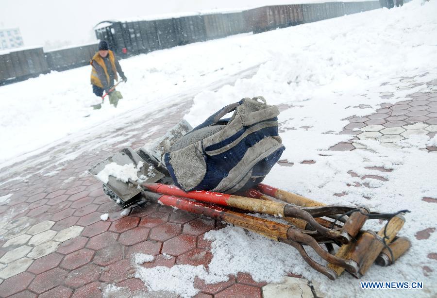 Shovels for snow cleaning are seen at the Hegang Railway Station in Hegang, northeast China's Heilongjiang Province, Nov. 13, 2012. Heavy snowstorms swept northeastern regions of Heilongjiang since last Sunday, forcing highways to close. Local authority of railway service initiated an emergency plan to maintain order of stranded passengers. (Xinhua/Wang Kai) 