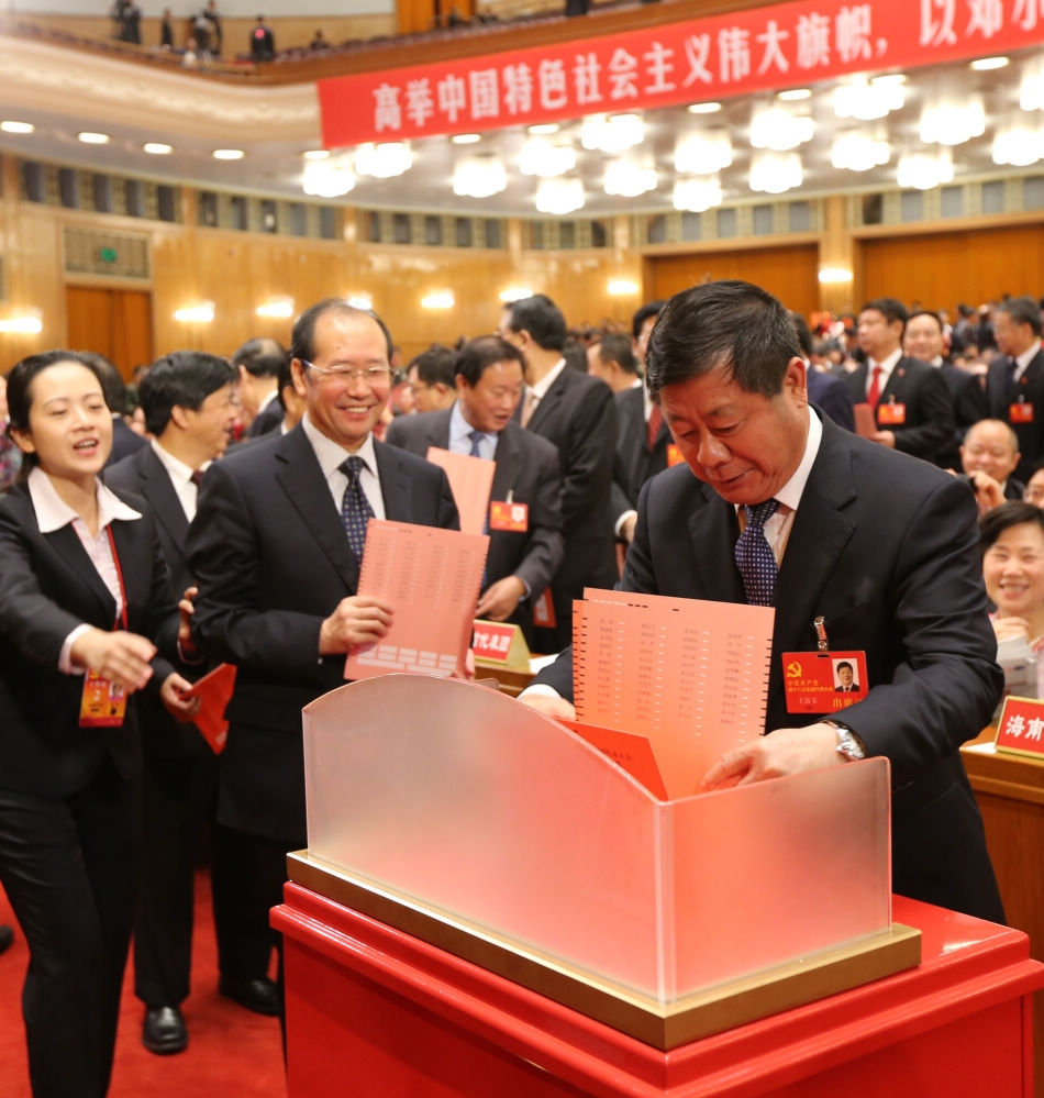 A delegate casts his ballot during the closing session of the 18th National Congress of the Communist Party of China (CPC) at the Great Hall of the People in Beijing, capital of China, Nov. 14, 2012. The congress started its closing session here Wednesday morning, at which a new CPC Central Committee and a new Central Commission for Discipline Inspection will be elected. (Xinhua/Yao Dawei)