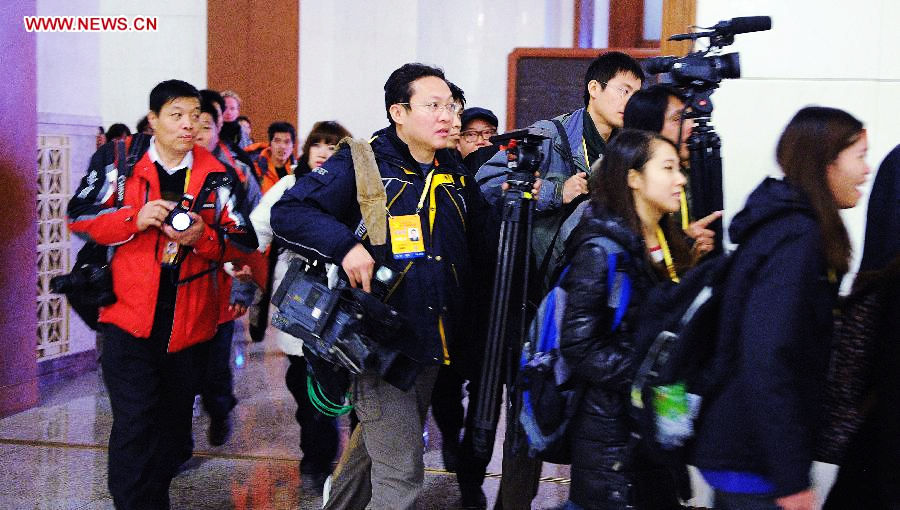 Journalists prepare to report the closing session of the 18th National Congress of the Communist Party of China (CPC) at the Great Hall of the People in Beijing, capital of China, Nov. 14, 2012. (Xinhua/Zhang Yan)