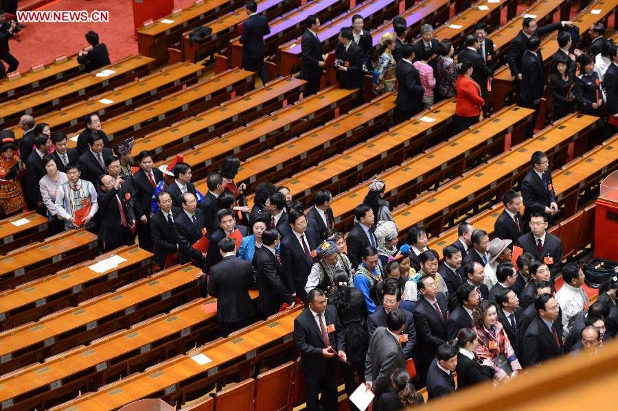 Delegates leave after the closing session of the 18th National Congress of the Communist Party of China (CPC) at the Great Hall of the People in Beijing, capital of China, Nov. 14, 2012. (Xinhua/Ma Zhancheng)