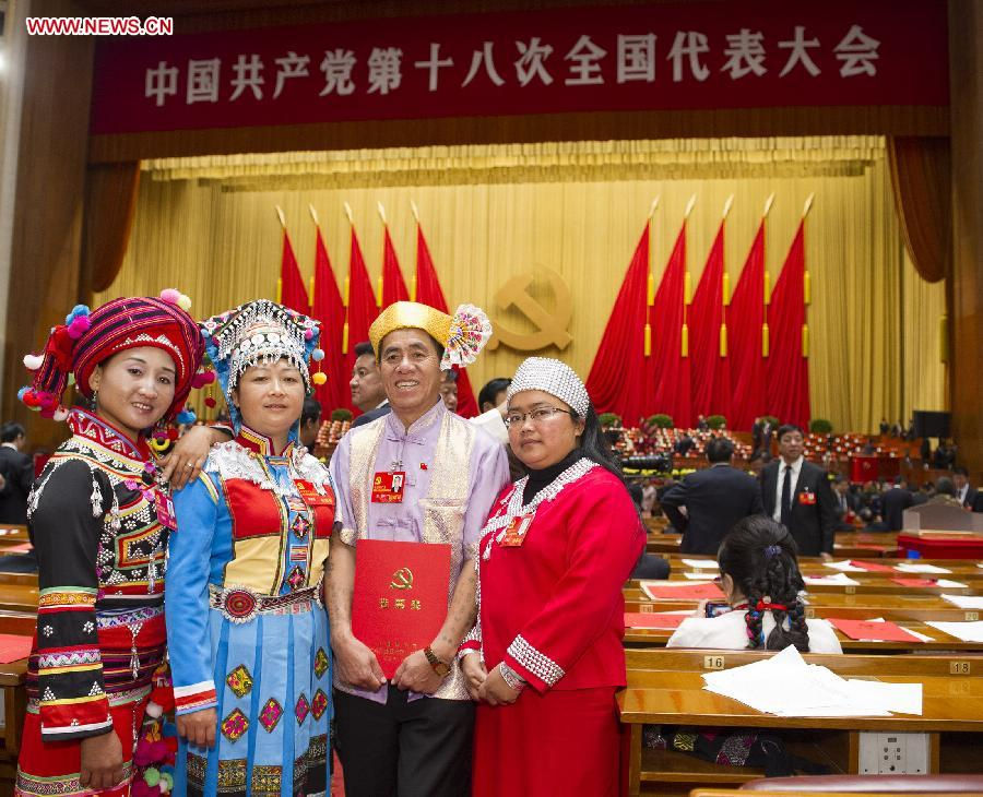 Delegates pose for a group photo after the closing session of the 18th National Congress of the Communist Party of China (CPC) at the Great Hall of the People in Beijing, capital of China, Nov. 14, 2012. (Xinhua/Huang Jingwen)