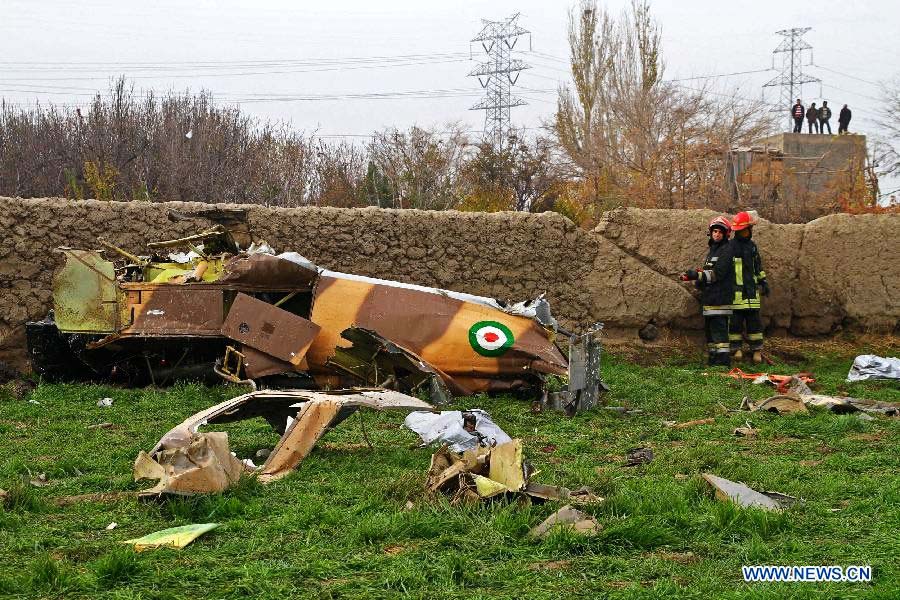Debris of a helicopter is seen near Mashhad in northeastern Iran on Nov. 14, 2012. The death toll of a rescue helicopter crash in northeastern Iran Wednesday morning has increased to ten, semi-official Mehr news agency reported. (Xinhua/Hamed)