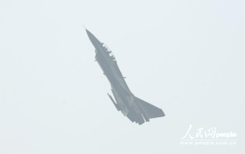 Several J-10 fighters from PLA Air Force perform at the opening ceremony of Airshow China 2012 on November 13 in Zhuhai in south China’s Guangdong province. Visitors highly praised the excellent piloting skill as well as the exceptional function of the jet fighters. (People’s Daily Online/ Yan Jiaqi)