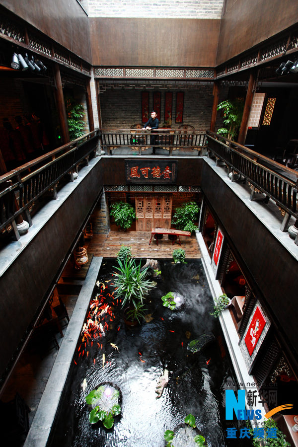 Liu enjoys the peace and comfort in the Shouzuo Mansion in Chongqing on Oct. 18, 2012.