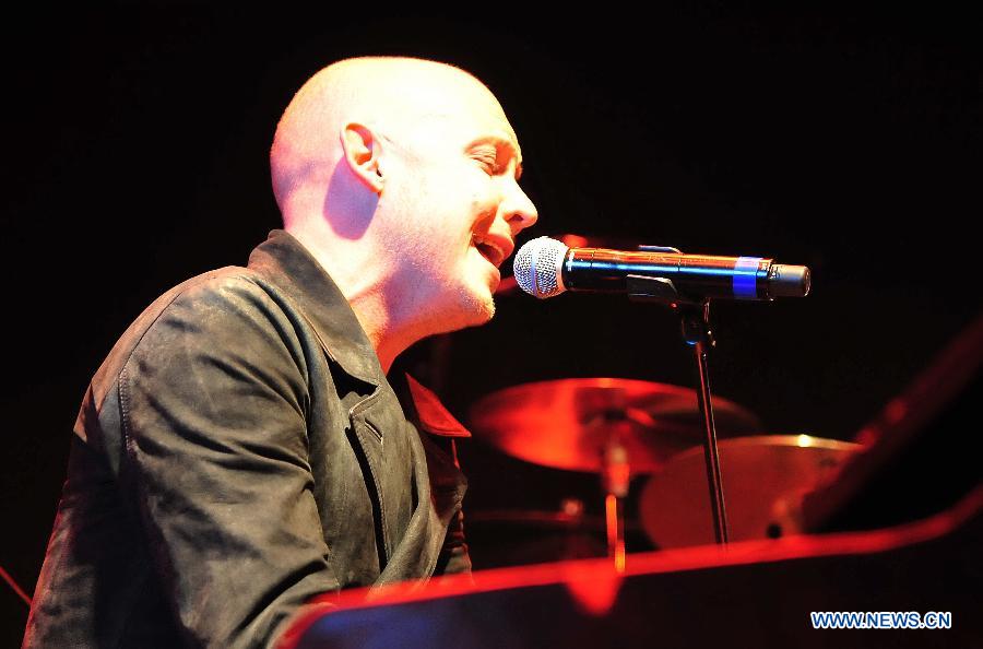Isaac Slade, lead vocals and piano of American piano rock band "The Fray", performs during a concert at Tango Club in Beijing, capital of China, Nov. 14, 2012. The band was formed in 2002 and featured by the use of the piano as the lead instrument in their music. (Xinhua/Xiao Xiao)