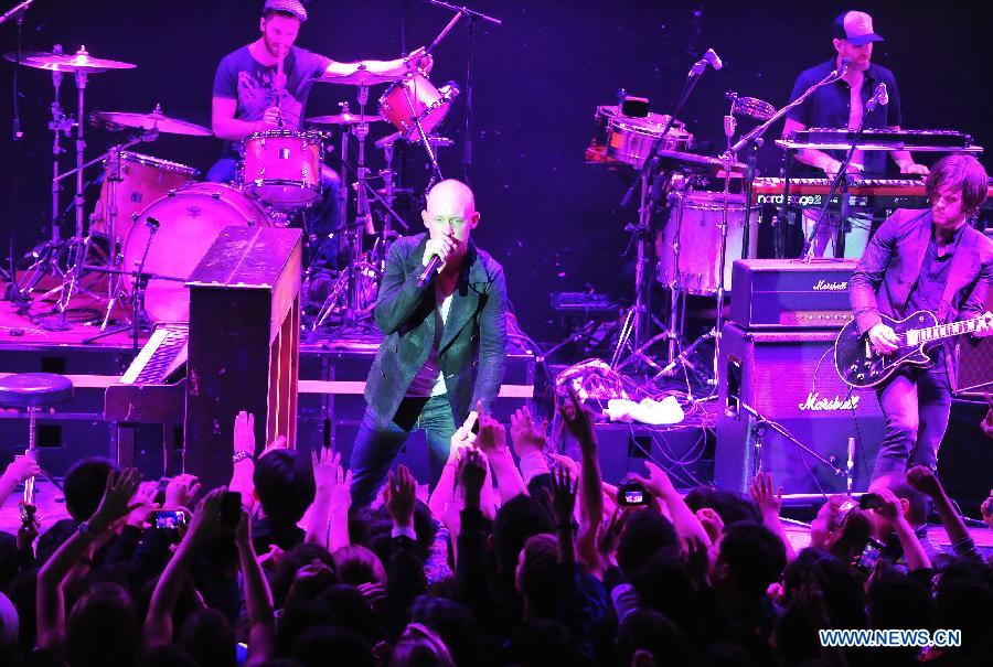 American piano rock band "The Fray" performs in a concert at Tango Club in Beijing, capital of China, Nov. 14, 2012. The band was formed in 2002 and featured by the use of the piano as the lead instrument in their music. (Xinhua/Xiao Xiao)