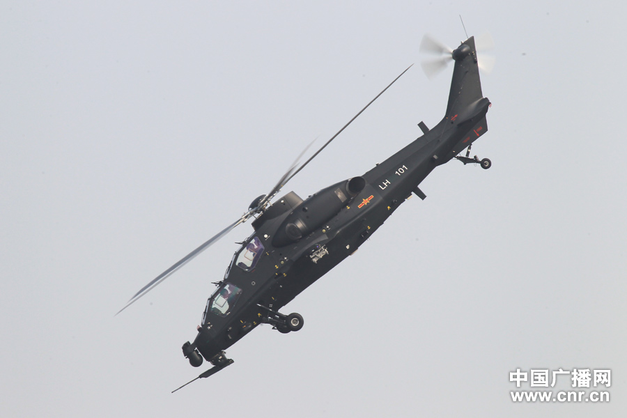 A WZ-10 attack helicopter practices on the first day of Airshow China 2012, which kicked off in south China’s Zhuhai on Nov. 13, 2012, after its first public appearance on Nov. 11, 2012. WZ-10, nicknamed China’s “Apache”, is the most advanced attack helicopter of the PLA and also the most expected Chinese aircraft at the Airshow China 2012. (CNR/Xu Ao)
