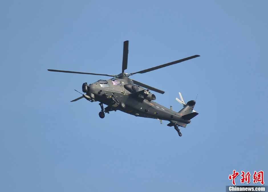 A WZ-10 attack helicopter flies at the Airshow China 2012 on Nov. 14, 2012. WZ-10, nicknamed China’s “Apache”, is the most advanced attack helicopter of the PLA and also the most expected Chinese aircraft at the Airshow China 2012. (Chinanews.com/Ke Xiaojun)