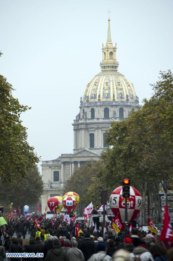 People attend a demonstration called by French trade unions, in Paris, France, Nov. 14, 2012. As part of the massive anti-austerity demonstration across Europe, thousands of French people took the streets on Wednesday to express their frustation over the austerity. (Xinhua/Etienne Laurent)