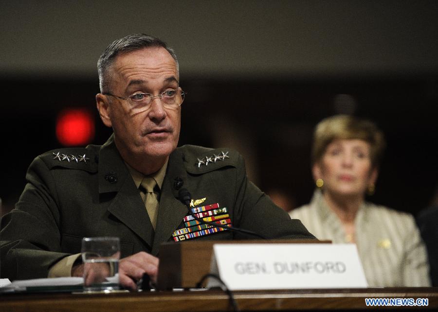 U.S. Marine General Joseph Dunford (L) testifies during his confirmation hearing before the Senate Armed Service Committee on Capitol Hill in Washington D.C., capital of the United States, Nov. 15, 2012. (Xinhua/Zhang Jun)