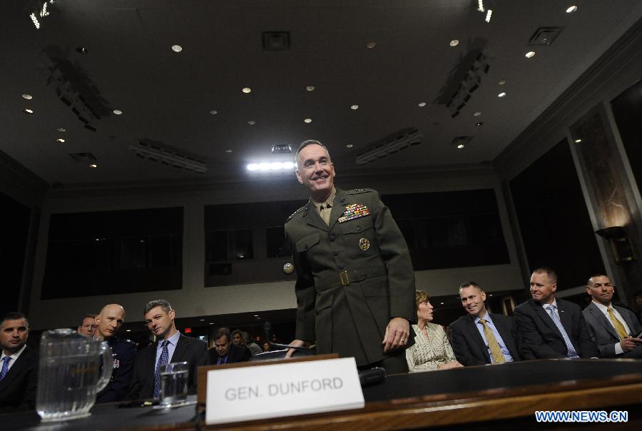 U.S. Marine General Joseph Dunford (C) testifies during his confirmation hearing before the Senate Armed Service Committee on Capitol Hill in Washington D.C., capital of the United States, Nov. 15, 2012. (Xinhua/Zhang Jun)