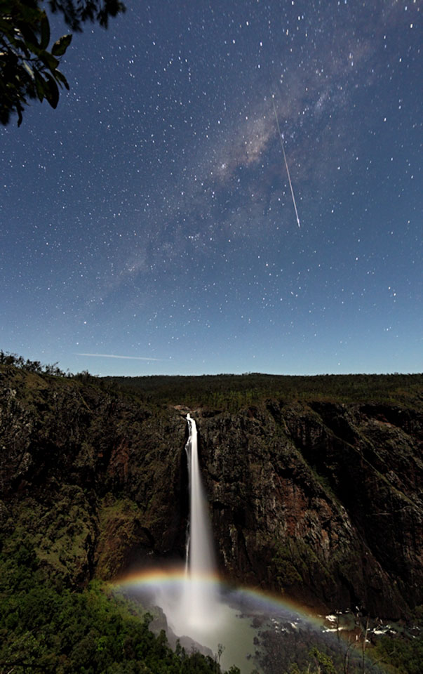 Meteor and Moonbow over Wallaman Falls. Which feature takes your breath away first in this encompassing panorama of land and sky? The competition is strong with a waterfall, meteor, starfield, and even a moonbow all vying for attention. (Photo/ NASA)