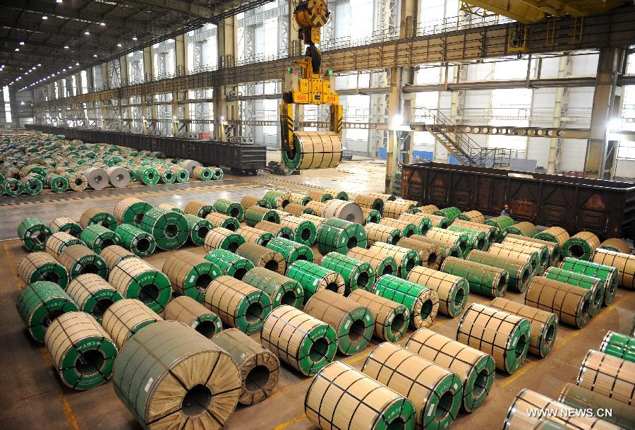 A stainless steel coil is lifted in Taiyuan Iron & Steel (Group) Company (TISCO) in Taiyuan, capital of north China's Shanxi Province, Nov. 15, 2012. Against the backdrop of sluggish steel industry, TISCO, the world's largest stainless steel enterprise, has optimized product structure with technical innovation, and managed to achieve revenue of 105.541 billion yuan (about 16.88 billion U.S. dollars) in the first three quarters of 2012, with a year-on-year growth rate of 11.4%. (Xinhua/Yan Yan) 