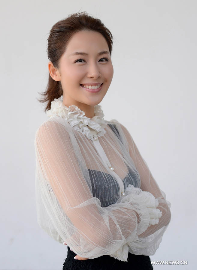 Chinese actress Li Chengyuan poses during a photo session of the martial arts film "Judge Archer" at the 7th Rome Film Festival in Rome, Italy, Nov. 16, 2012. (Xinhua/Wang Qingqin) 