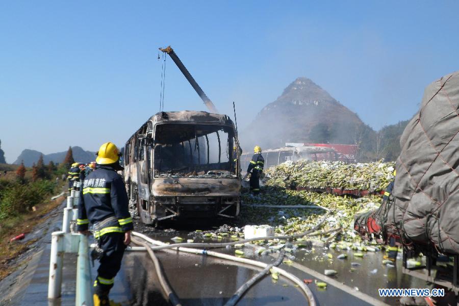 Photo taken on Nov. 17, 2012 shows a traffic accident site on the Shanghai-Kunming expressway in Anshun City, southwest China's Guizhou Province. The pileup accident occurred at about 9 a.m. Saturday on the Hukun (Shanghai - Kunming) expressway in Anshun City, leaving nine people dead and 19 others injured. More than 25 vehicles involved in the accident, and seven of them burst into flames. (Xinhua)