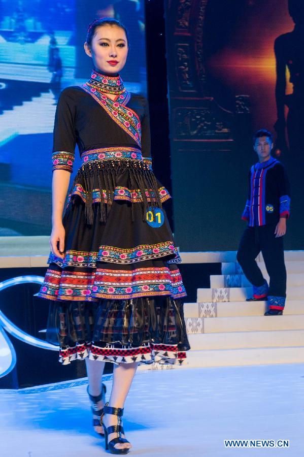 Models present creations during the 2012 She Ethnic Group Dress Design Competition in Jingning She Autonomous County, east China's Zhejiang Province, Nov. 17, 2012. The competition, with the aim to exploit the folk custom and ethnic costume of She Ethnic Group, attracted many contestants. (Xinhua/Li Suren) 