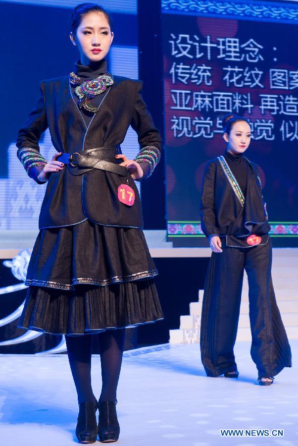 Models present creations during the 2012 She Ethnic Group Dress Design Competition in Jingning She Autonomous County, east China's Zhejiang Province, Nov. 17, 2012. The competition, with the aim to exploit the folk custom and ethnic costume of She Ethnic Group, attracted many contestants. (Xinhua/Li Suren) 