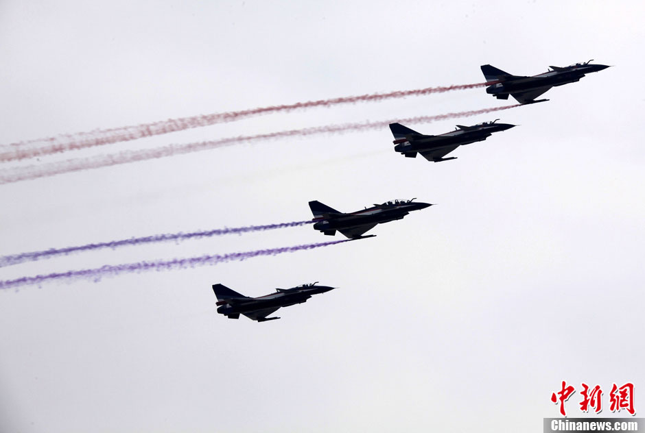 Four J-10 fighters of PLA's Bayi (August 1) Aerobatics Team fly during Airshow China 2012 on Nov. 14, 2012, in south China’s Zhuhai. (Chinanews.com/Sun Zifa)