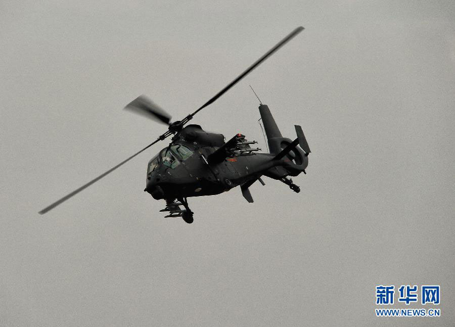 A WZ-10 attack helicopter practices at the Airshow China 2012. WZ-10, nicknamed China’s “Apache”, is the most advanced attack helicopter of the PLA and also the most expected Chinese aircraft at the airshow. (Photo/Xinhua)