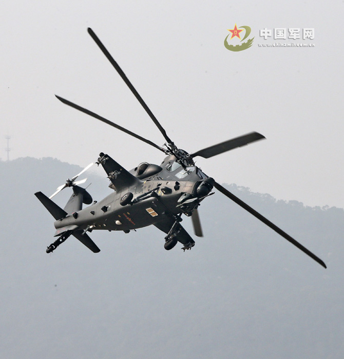 China's independently-developed WZ-10 armed helicopter debuted at the 9th China International Aviation & Aerospace Exhibition in Zhuhai, south China's Guangdong province on November 13, 2012, and showed its good performance in the demonstration.The photo shows that a WZ-10 armed helicopter is in side-whirling flight. (chinamil.com.cn/Qiao Tianfu)