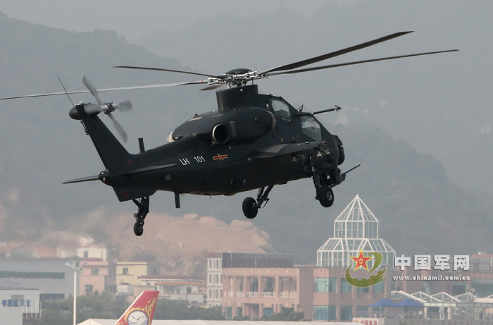 China's independently-developed WZ-10 armed helicopter debuted at the 9th China International Aviation & Aerospace Exhibition in Zhuhai, south China's Guangdong province on November 13, 2012, and showed its good performance in the demonstration. The photo shows that a WZ-10 armed helicopter is rotating for 360 degrees. (chinamil.com.cn/Qiao Tianfu)
