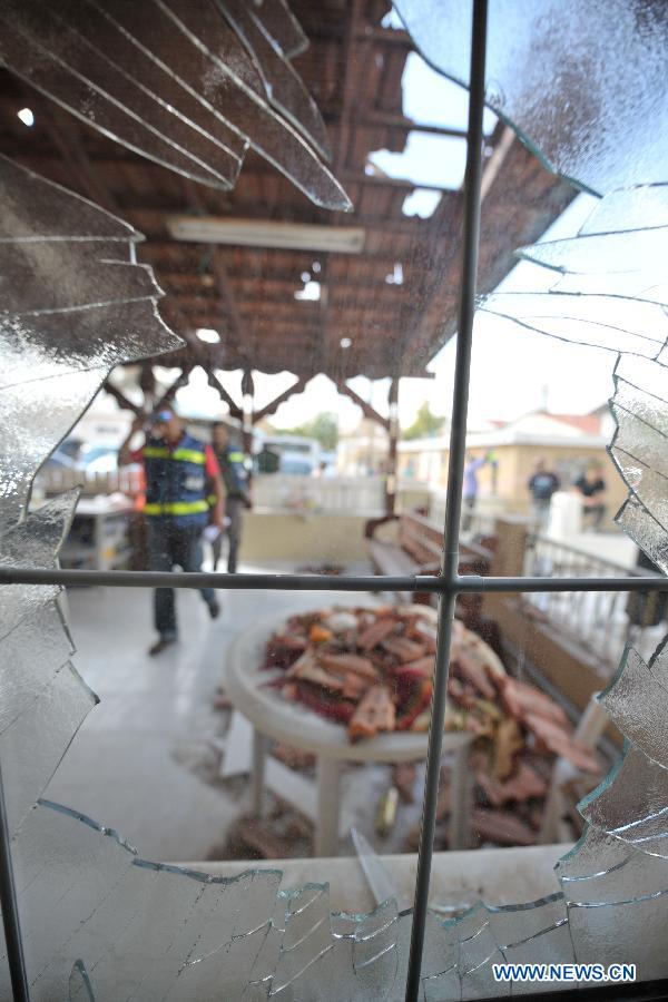A house is damaged by mortar rocket fired from the Gaza Strip, in Ofakim, South Israel, on Nov.19, 2012. Rocket fire against Israel resumed Monday morning. (Xinhua/Yin Dongxun) 
