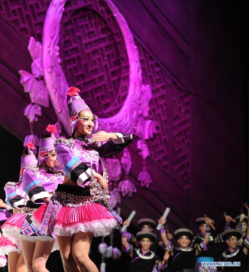 Dancers perform during a dancing show about the tradition of Miao and Dong ethnic groups in Kaili City of Qiandongnan, southwest China's Guizhou Province, Nov. 19, 2012. (Xinhua/Tao Liang) 