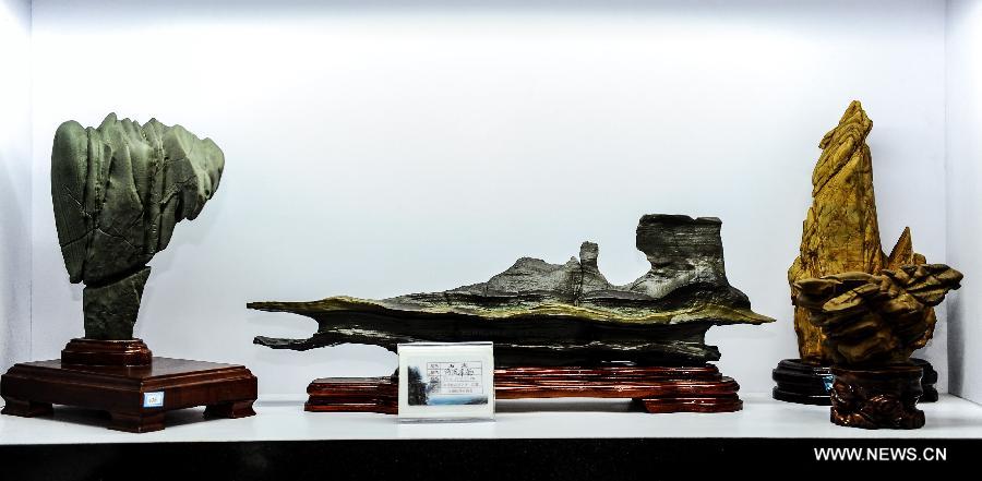 Photo taken on Nov. 19, 2012 shows the artworks made of Songhua stones in the Songhua Stone Museum in Jiangyuan District of Baishan City, northeast China's Jilin Province. Baishan City is known as the hometown of Songhua stones. (Xinhua/Xu Chang) 