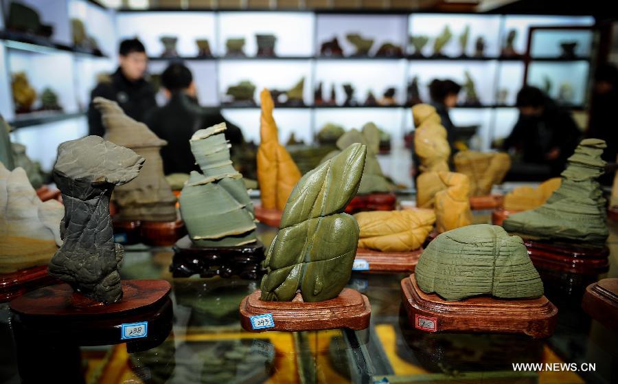 Photo taken on Nov. 19, 2012 shows the artworks made of Songhua stones in the Songhua Stone Museum in Jiangyuan District of Baishan City, northeast China's Jilin Province. Baishan City is known as the hometown of Songhua stones. (Xinhua/Xu Chang) 