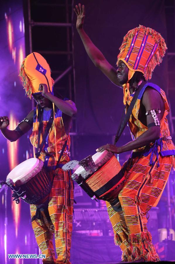 An african drum band performs at the opening ceremony of the first China Puer International Country Music Festival in Puer, southwest China's Yunnan Province, Nov. 20, 2012. The festival kicked off on Tuesday with the participation of more than 20 bands and singers. The new silk road Miss World contest will also be held along with the festival. (Xinhua/Li Mingfang) 