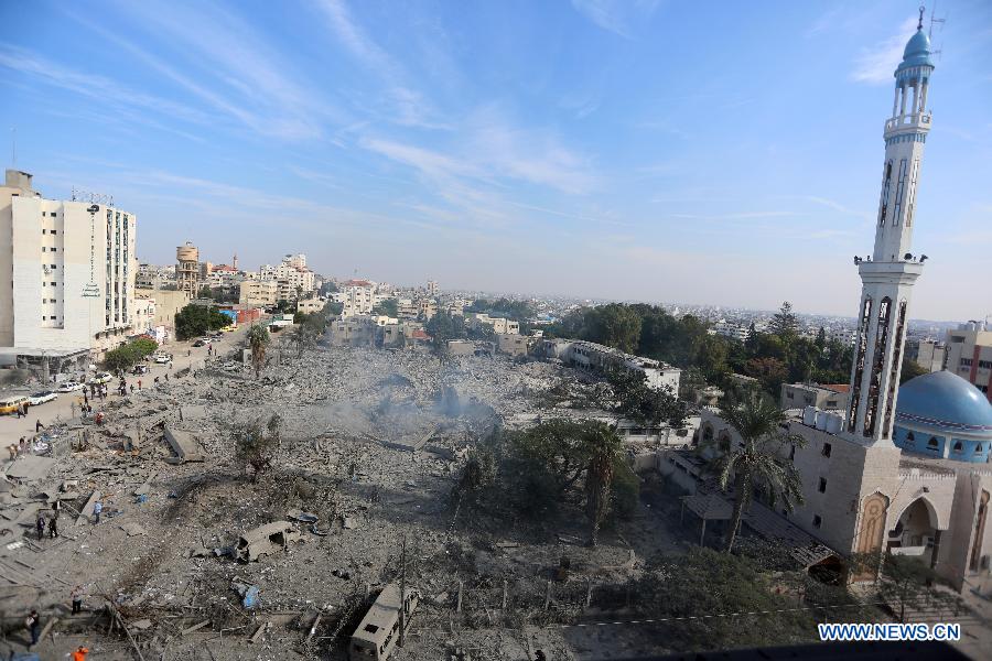 A destroyed compound of the internal security ministry is seen in Gaza City after it was targeted by an overnight Israeli air strike on Nov. 21, 2012. (Xinhua/Wissam Nassar) 