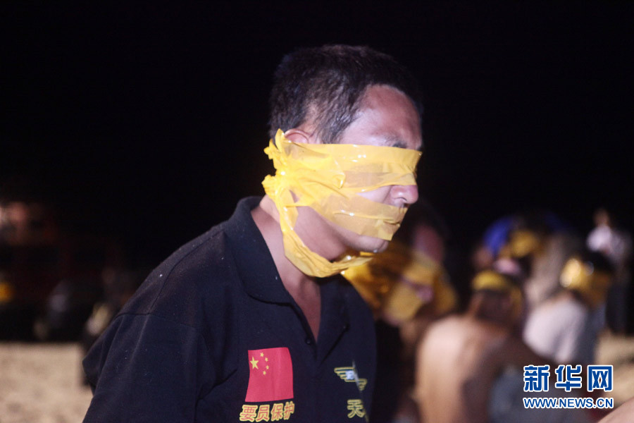 Hostage rescue training at night. (Xinhua/Liu Changlong)