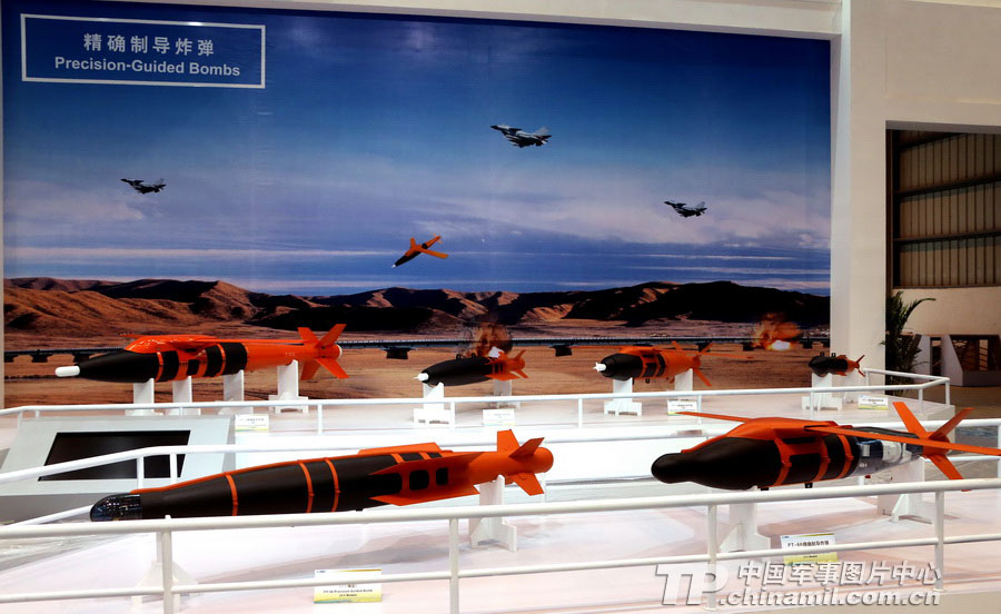 The photo features the scene of the precision-guided bomb models shown at the 9th Zhuhai Air Show in China. The series precision-guided bombs can greatly improve combat power of fighters. (chinamil.com.cn/Qiao Tianfu)