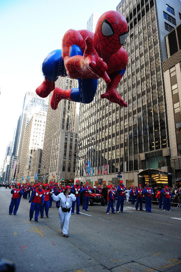 The Spiderman balloon floats in the 86th Macy's Thanksgiving Day Parade in New York, the United States, Nov. 22, 2012. More than three million people gather along the street on Thursday, to attend the annual Macy's parade which began in 1924. (Xinhua/Deng Jian)