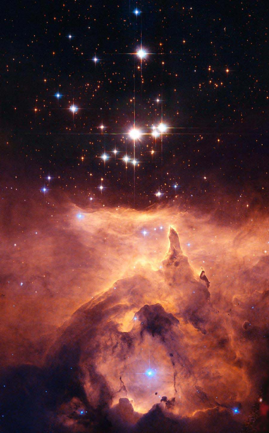 NGC 6357: Cathedral to Massive Stars. Estimates made from distance, brightness and standard solar models had given one star in the open cluster Pismis 24 over 200 times the mass of our Sun, nearly making it the record holder. (Photo/ NASA)