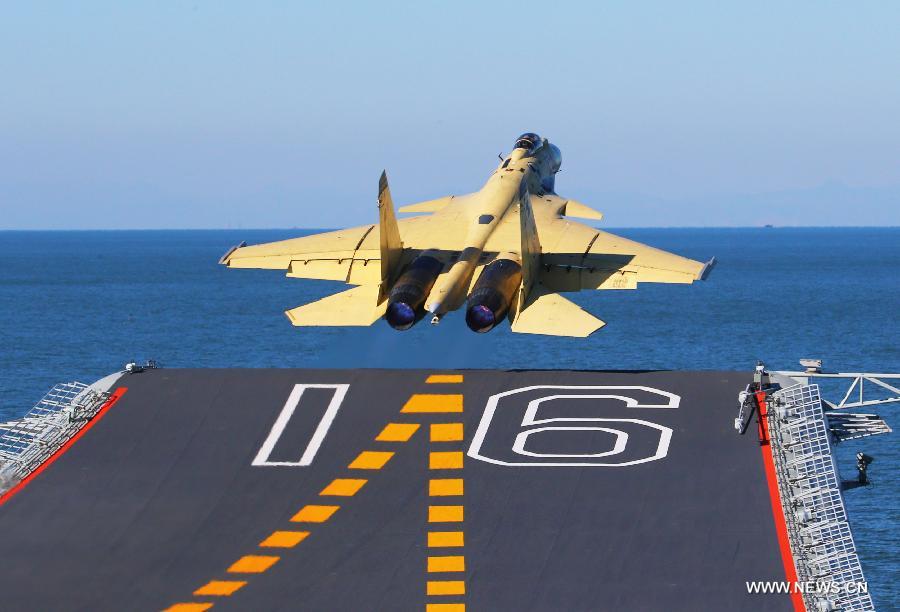 This undated photo shows a carrier-borne J-15 fighter jet taking off from China's first aircraft carrier, the Liaoning. (Xinhua/Zha Chunming)