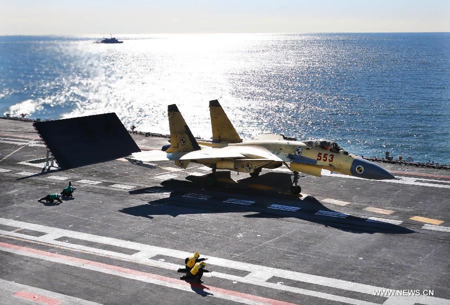 This undated photo shows a carrier-borne J-15 fighter jet ready to take off from China's first aircraft carrier, the Liaoning.(Xinhua/Zha Chunming) 