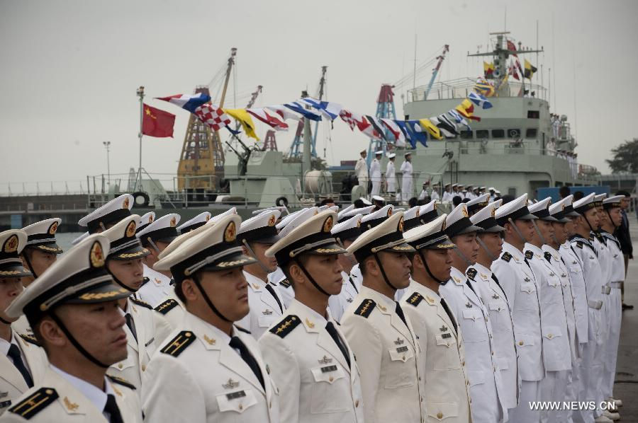 Soldiers of the Chinese People's Liberation Army (PLA) take part in the rotation ceremony at the Stonecutters Island Naval Base in Hong Kong, south China, Nov. 25, 2012. The Chinese PLA garrison troops in the Hong Kong Special Administrative Region (HKSAR) conducted its 15th troop rotation on Sunday since it assumed Hong Kong's defense responsibility on July 1, 1997. (Xinhua/Lui Siu Wai) 