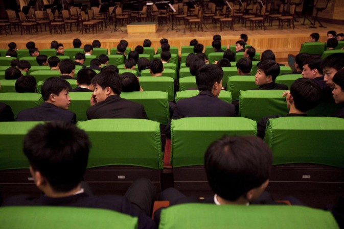 The audience sit in an opera house in Pyongyang, waiting for the classic music performance to begin.(Photo/Xinhua)