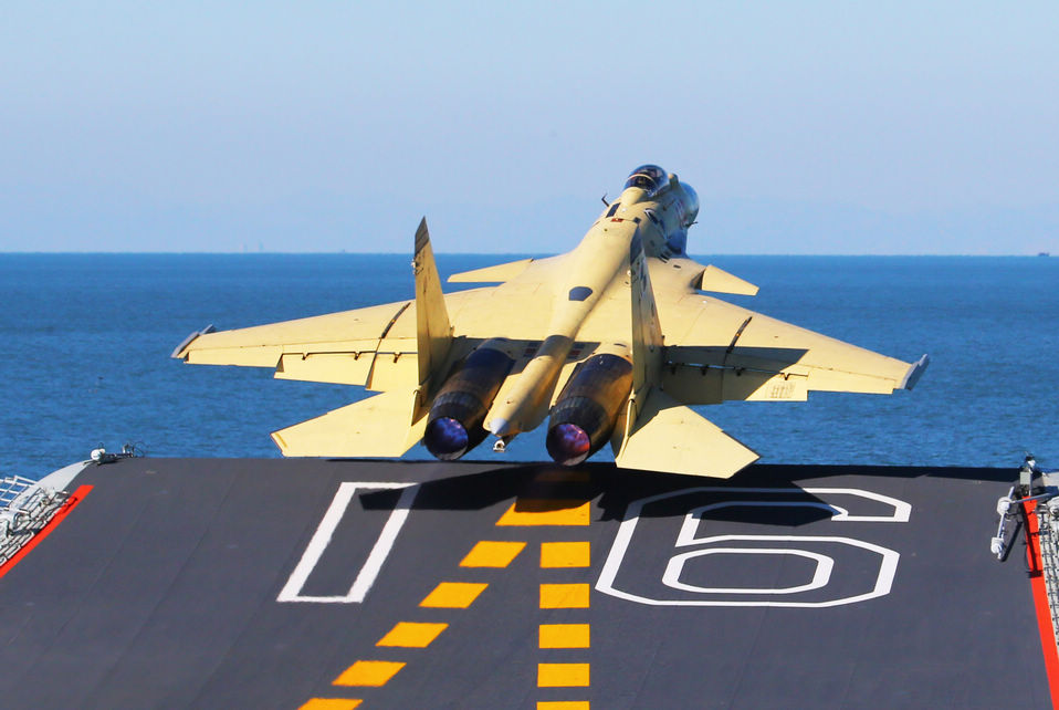 A J-15 fighter jet takes off from China's first aircraft carrier, the Liaoning.(Xinhua/Cha Chunming)